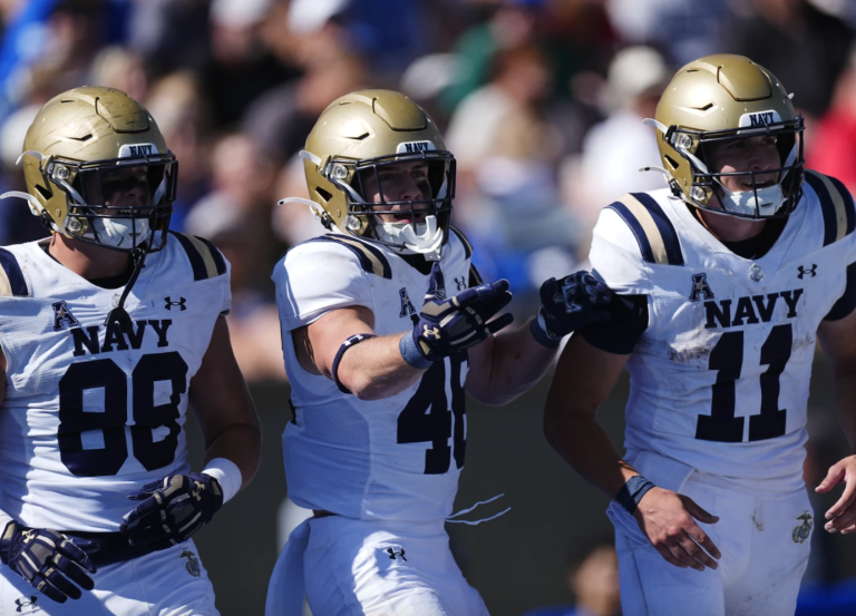 Navy sails past USF 28-7, torpedoes homecoming